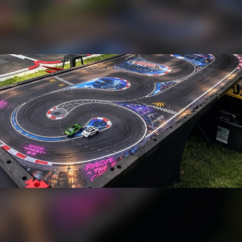 Dream Racer drift track mat set up with RC drift cars — Neon City Circuit design